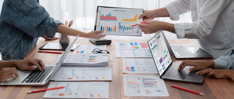 Analyst team utilizing BI Fintech to analyze financial report. Scrutinize