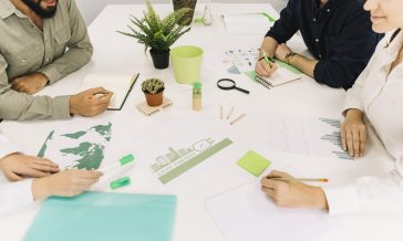 group-businesspeople-making-strategy-energy-saving-office