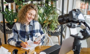 Pretty blonde woman, blogger and influencer testing new products